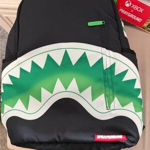 Sprayground Black and Green Shark Backpack